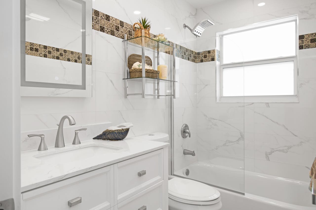 Home Contemporary bathroom with clean design, marble tiles, and sleek fixtures.